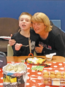 Debbie Cordone of Cheektowaga recently started Fantastic Friends of Western New York, a nonprofit that works with kids with autism and their families. Next to her is James, her son.