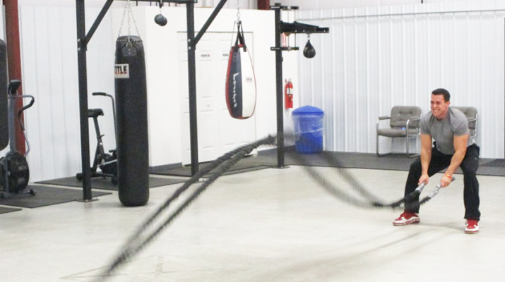 Impact Fitness: Strength Trainer Chris Cammarata demonstrates the battle ropes