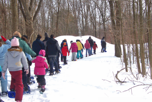 Group of people snowshoeing at Reinstein Woods Nature Preserve in Cheektowaga. 