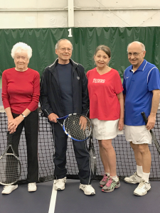 Tennis foursome at Miller Tennis Center in Williamsville is, from left, Faye Lueth, Tom Kalman, Judy Behr and Ernie Beck. Photo courtesy of Judy Behr.