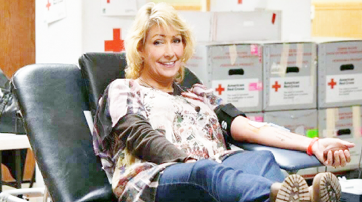  Carolyn Woomer donating blood at blood drive in Tonawanda in her son’s, Jed, memory.
