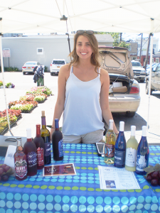Kara Schanbacher of Lake View pours wine samples  from Winery of Ellicottville every Saturday morning at the Hamburg Farmers’ Market.