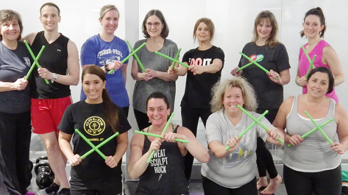 Participants at April Woolley’s Tuesday night POUND class at the Fisher-Price Fitness Place in East Aurora. POUND has become the new trend in exercising in Western New York