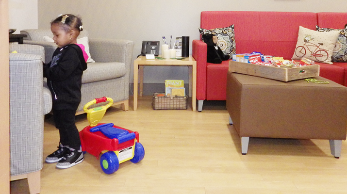 A child plays with toys at The Ronald McDonald House Family Lounge on the fifth floor of Oishei Children’s Hospital.