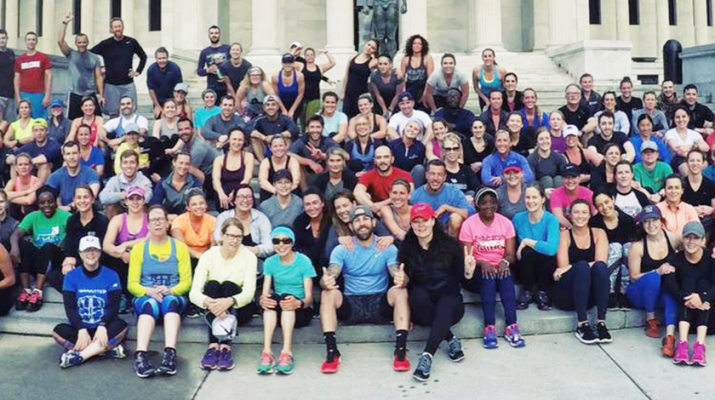 Members of the Buffalo chapter of the November Project. They’re in front of the Albright-Knox Art Gallery during one of their Wednesday morning workouts.