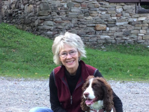 Gwenn Voelckers and her dog Scout enjoying some leaf peeping at Harriet Hollister Park at the end of Canandaigua Lake.