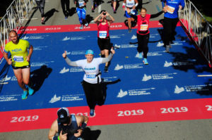 Cheektowaga writer Jenna Schifferle crosses the finish line at the Bank of America Chicago Marathon, Oct. 13.