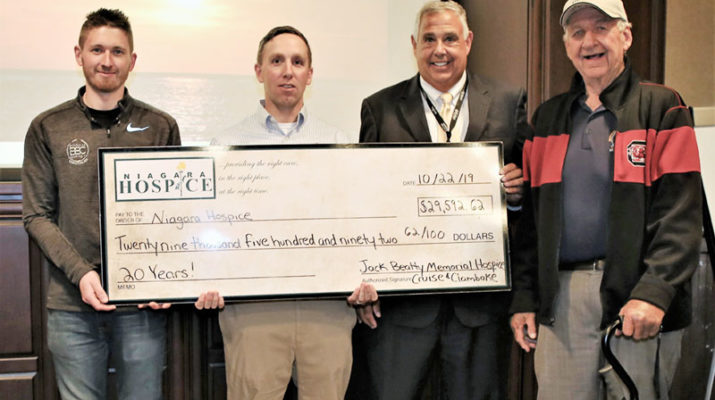 The Jack Beatty Memorial Hospice Cruise & Clambake event committee presents a check for $29,592.62 from the proceeds of the 20th anniversary held in July. From left are: Paul Beatty, III; Adam Burns, John Lomeo, Niagara Hospice president & CEO, and Paul Beatty, Sr.