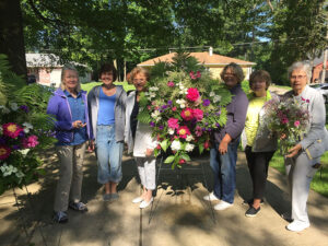 Members of the Hamburg Garden Club gathered flowers from their own gardens and put together floral arrangements for the Hamburg High School graduation, a project they undertake annually. 
