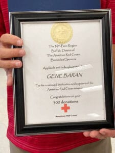 Plaque recognizing Gene Baran as a top blood donor.