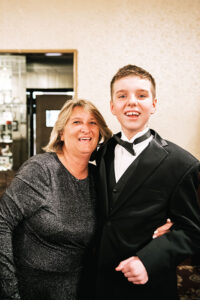 Debbie Cordone is the founder and president of the Fantastic Friends of Western New York. Next to her is James, her son