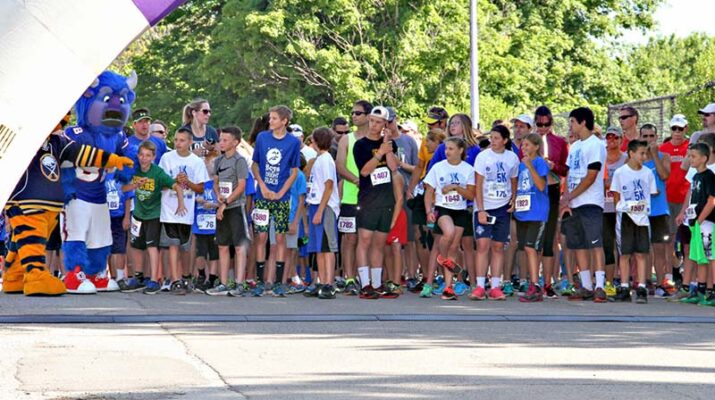 Participants in the Boys on the Right Track program prepare to compete in their first-ever 5k run held last fall at Union Pleasant Elementary School in the village of Hamburg.